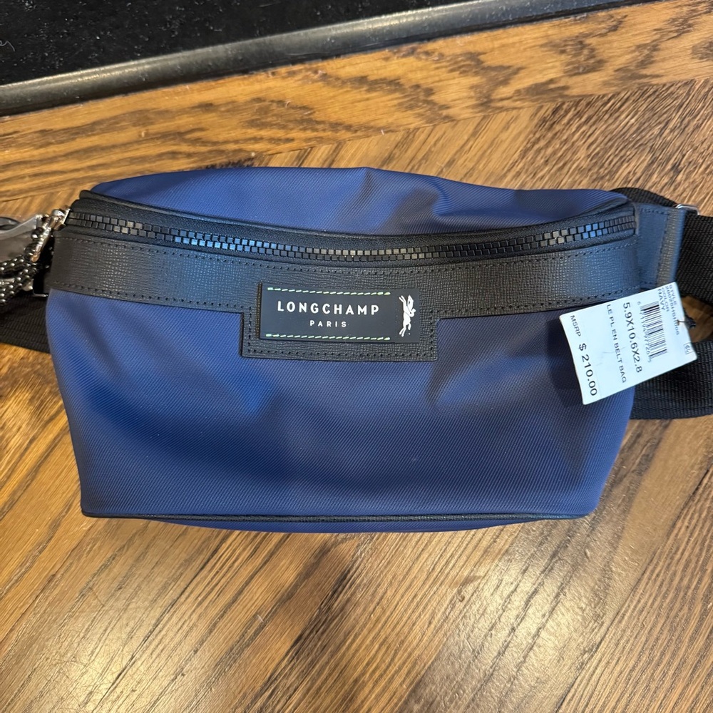 Longchamp Blue Belt Bag with Black Trim and Minimalist Design